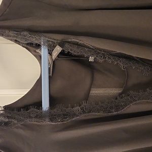 NWT sophisticated black top with lace trim
